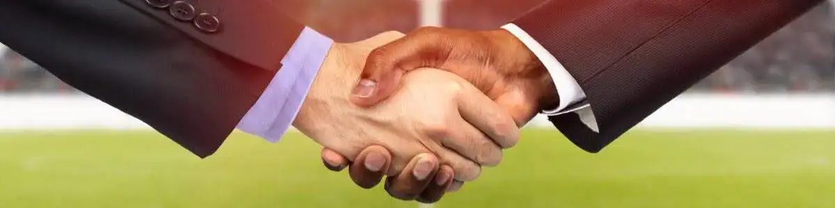 football player with ball in a football stadium